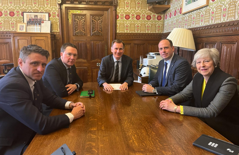 Ben Everitt MP (left, near), with the Chancellor of the Exchequer Jeremy Hunt (middle), Robert Courts MP, (left, back), Greg Smith MP (right, back) and Theresa May MP (right, near)