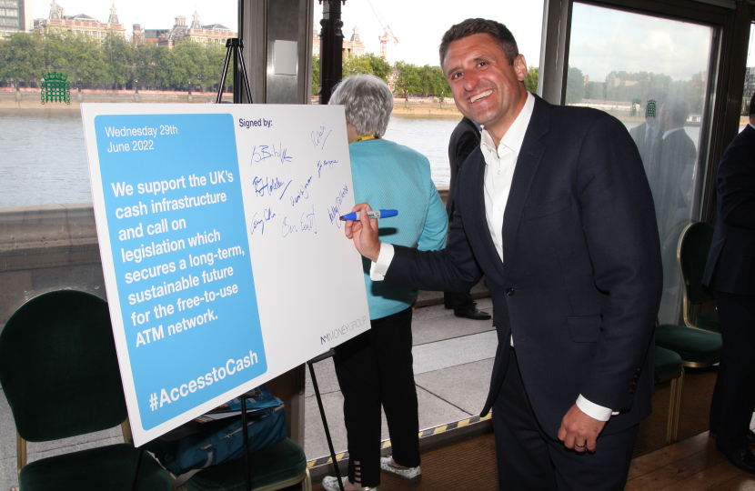 Ben Everitt MP Signing The Pledge To Ensure Access To Cash For Residents