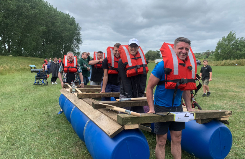 Ben leading his team out with the raft