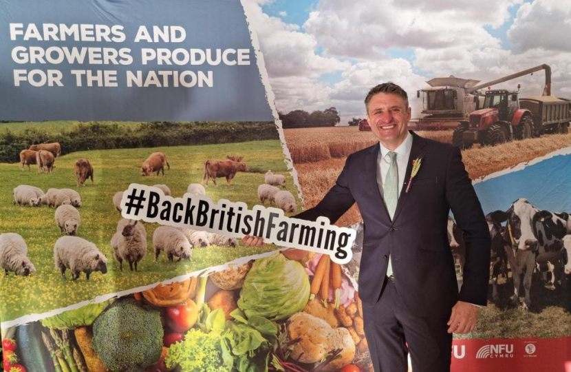 Ben holding the #BackBritishFarming sign