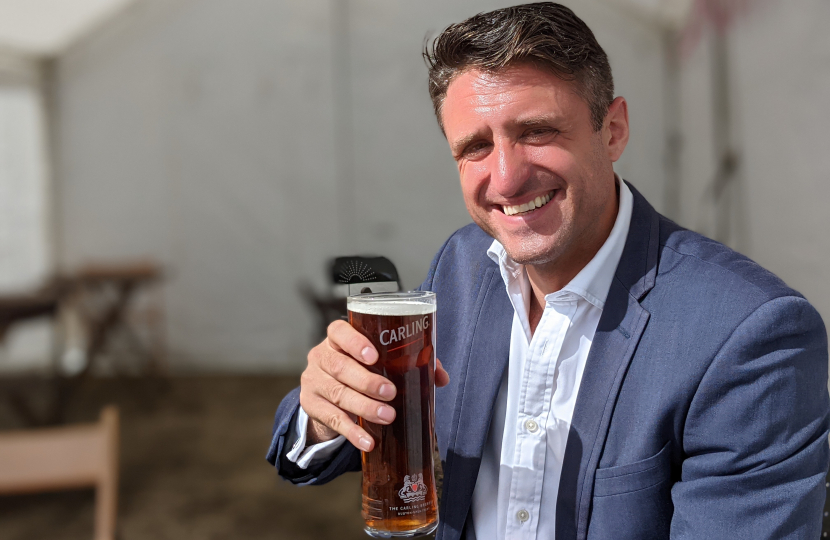 Ben Everitt MP with a beer