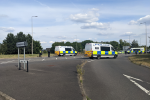 Police at the site of the illegal encampment at Oakgrove School