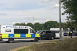 Police at the site of the Oakgrove School illegal encampment