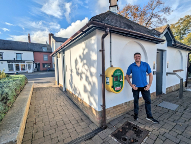 Ben Everitt MP at one of Olney's defibrillator locations