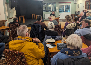 Ben Everitt MP speaking at a public meeting in Hanslope