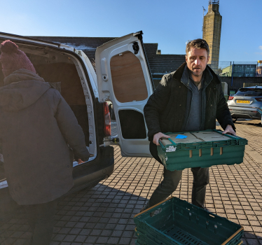 Ben Everitt MP helping deliver parcels with St Mark's Meals