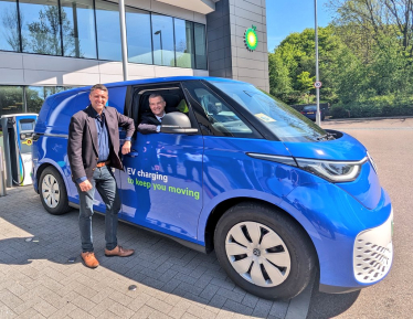 Transport Secretary Mark Harper at bp Pulse's Milton Keynes HQ with local MP Ben Everitt